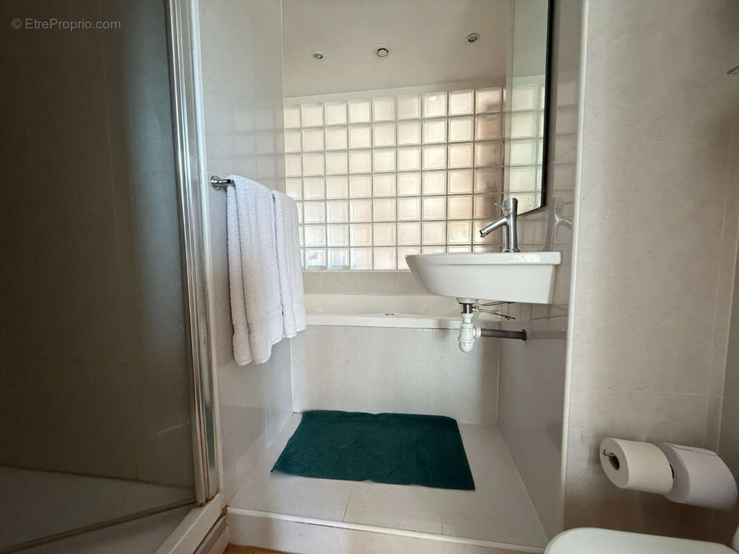 Appartement d'exception de 93m2 avec Terrasse et Cave - photo 8
