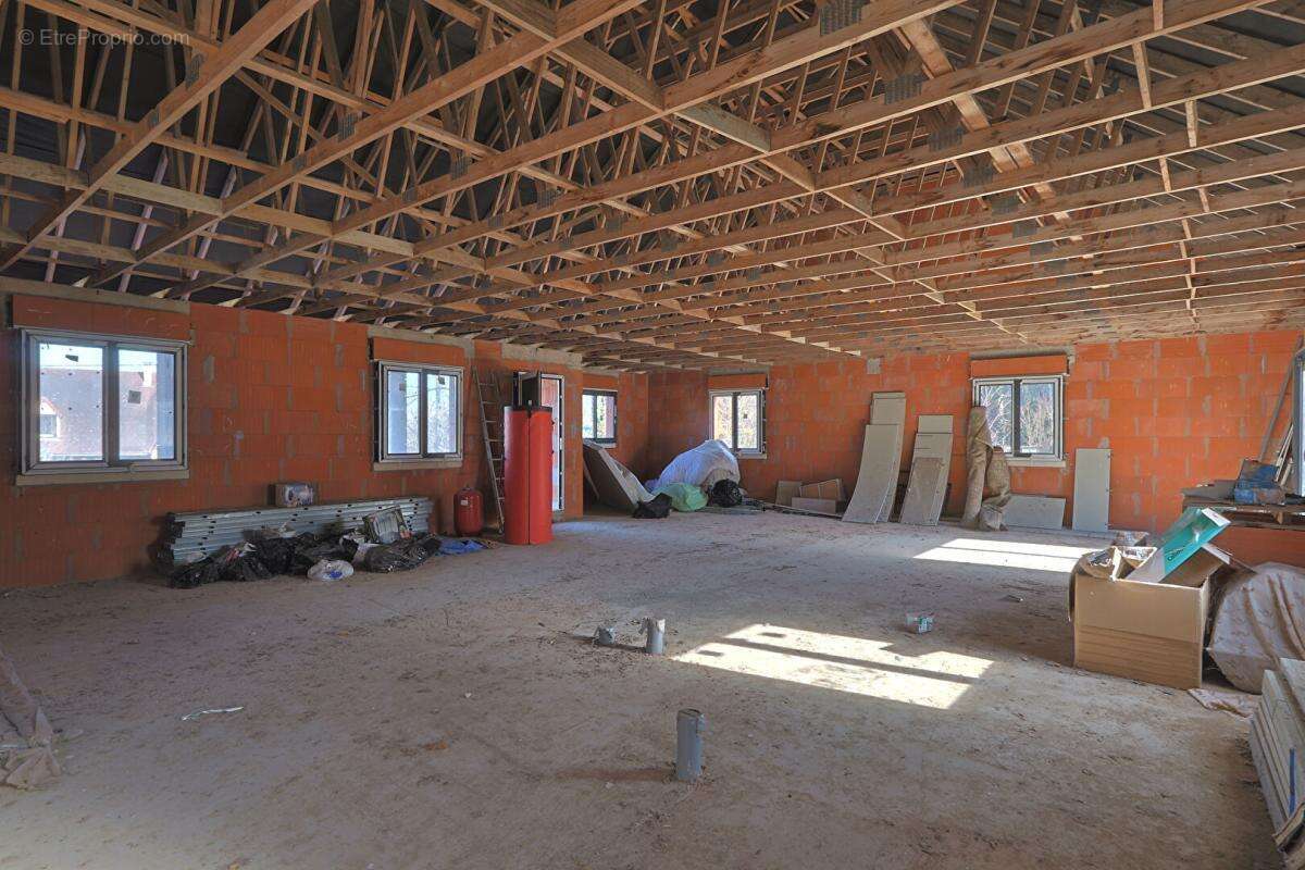 Maison de plain pied de 130m² - photo 3