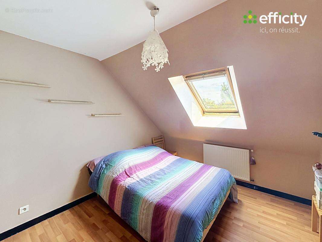 Maison 120 m² à Saint-Jacques-De-La-Lande  - photo 11