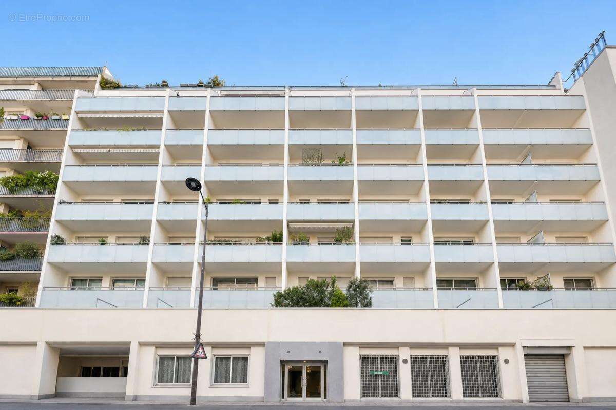 Appartement 3 pièces loué Paris 18e - photo 5