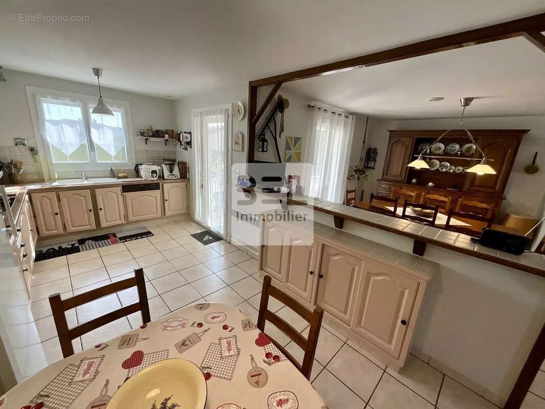 Maison à LAUDUN-L'ARDOISE