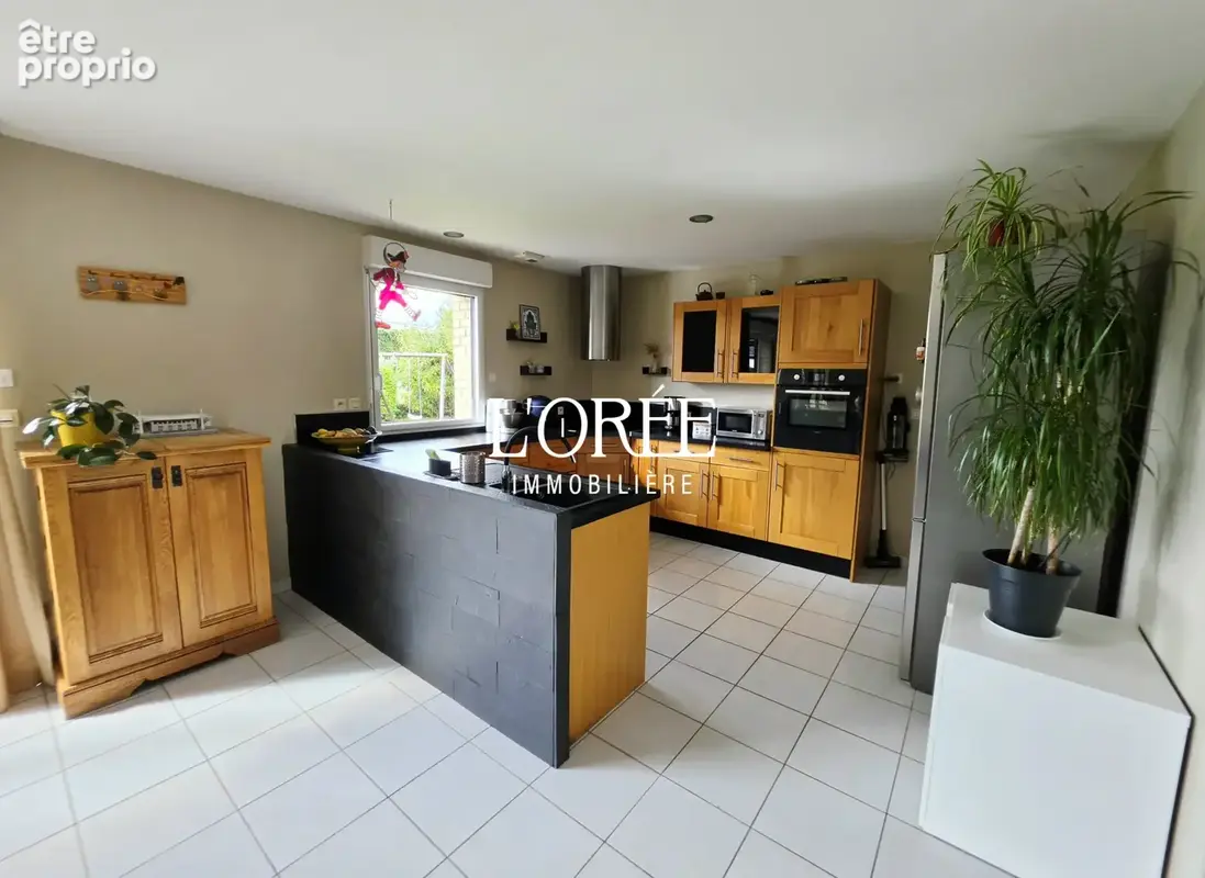 Pavillon individuel en brique - semi plain pied - 140m2 - 4 chambres - jardin  - garage - photo 6