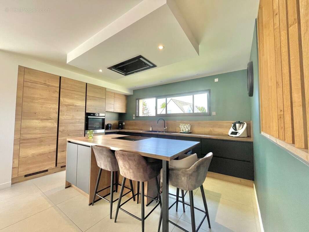 Maison 134 m² à Bourg-Des-Comptes  - photo 7