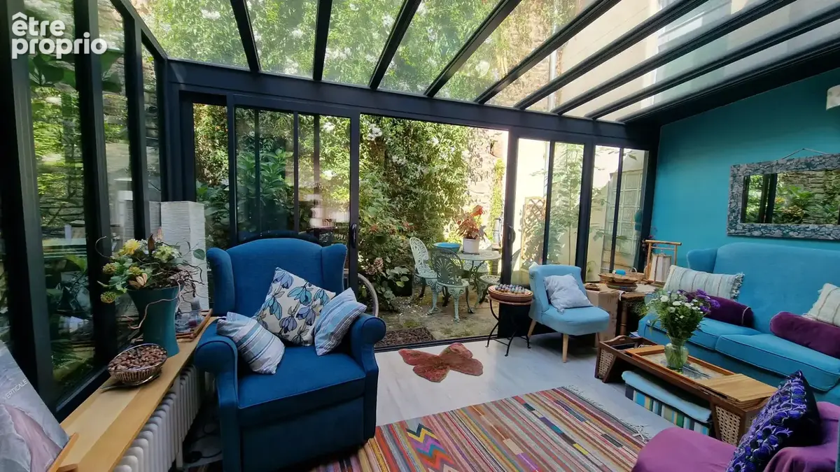 DINAN - Maison de caractère avec extension vitrée magnifique sur courette. - photo 6