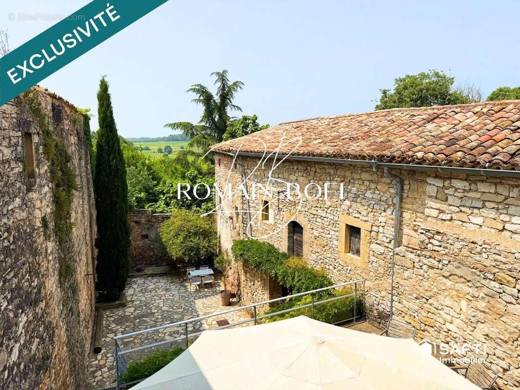 Maison 205 m² à Castelnau-Valence  - photo 5