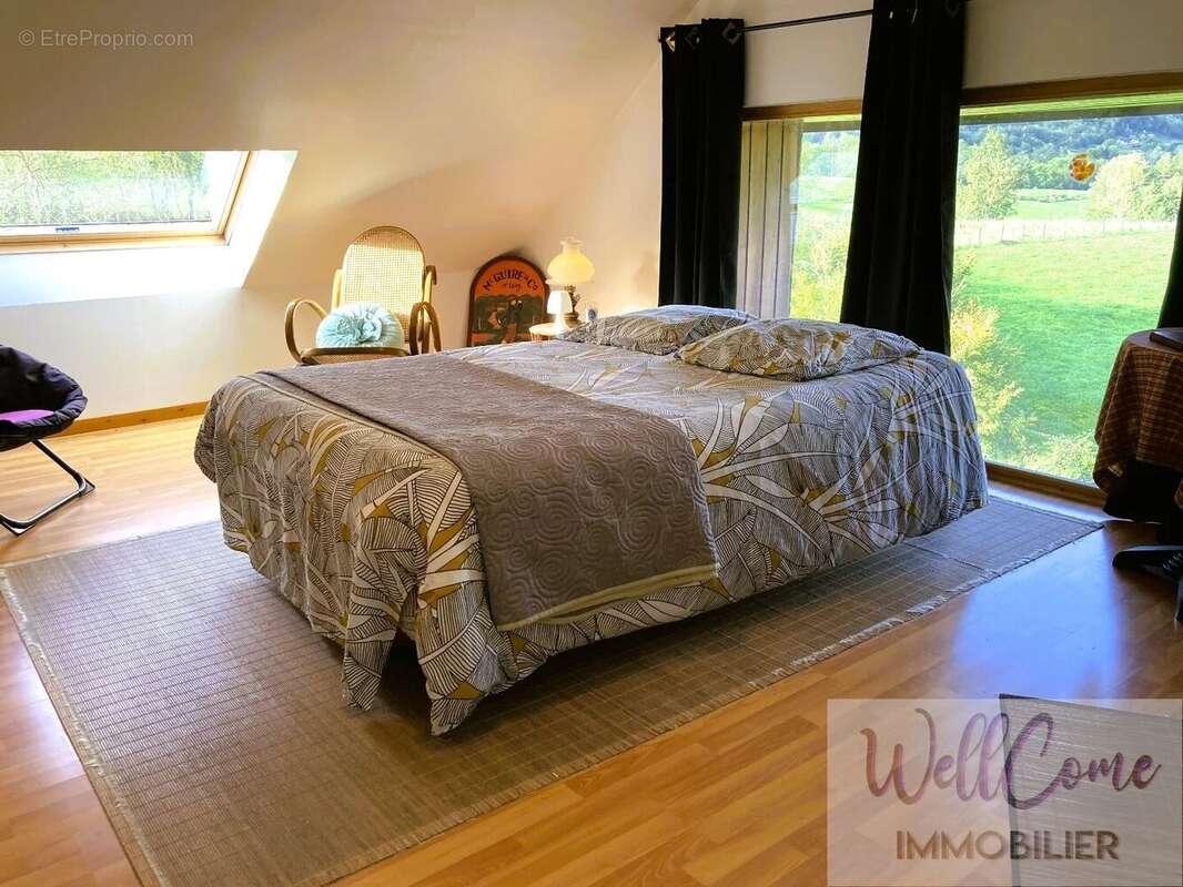 Maison à SAINT-THIBAUD-DE-COUZ