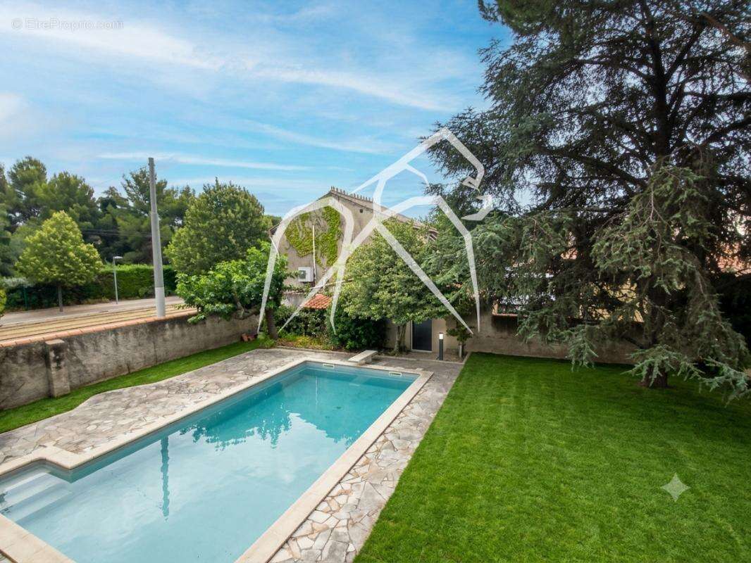 Rare à Montpellier Aiguerelles  Maison 8 pièces 230 m² avec piscine et terrain de 1 100 m²  fort potentiel – nombreux aménagemen - photo 18