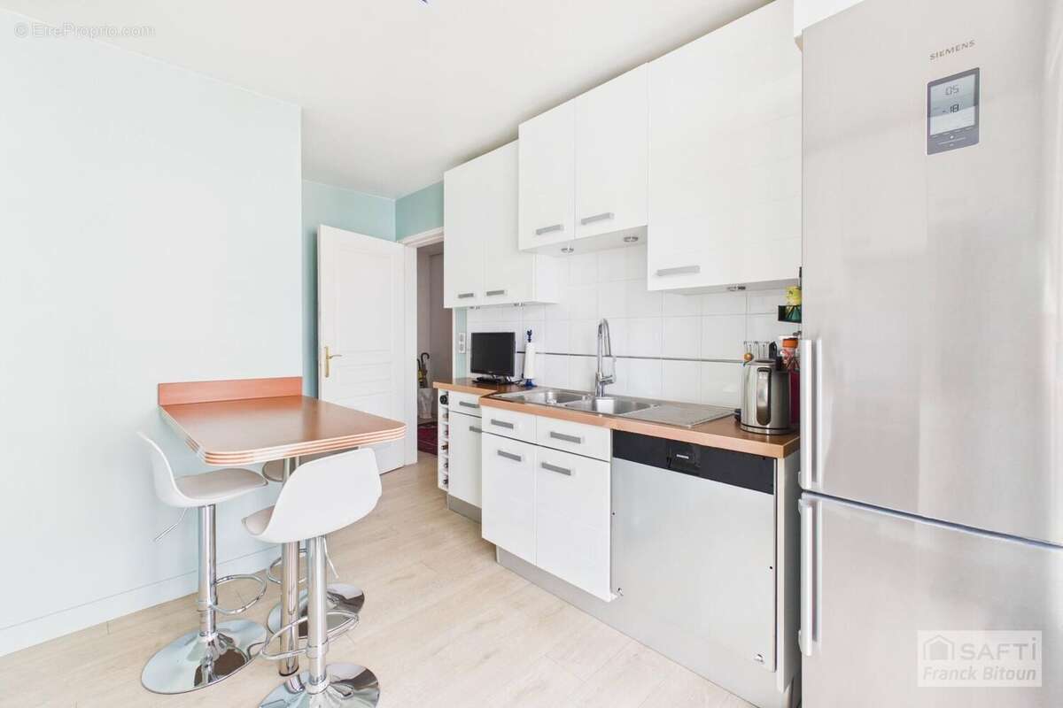 Photo 9 - Appartement à COURBEVOIE