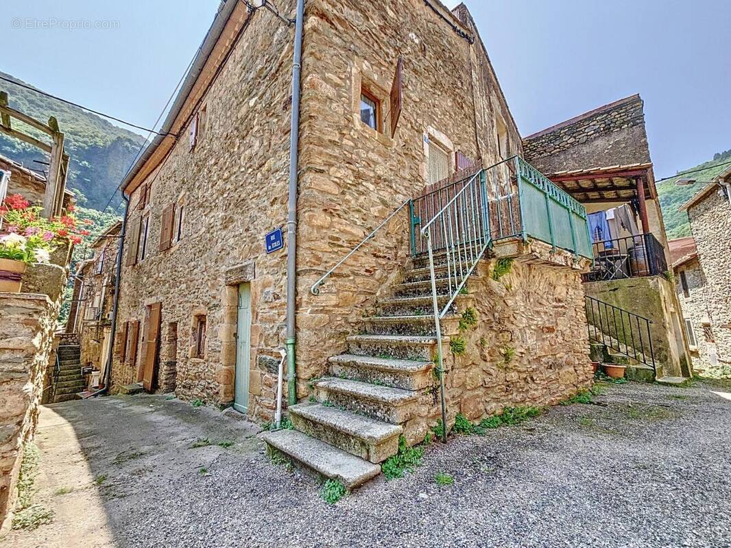 Photo 1 - Maison à SAINT-ETIENNE-ESTRECHOUX