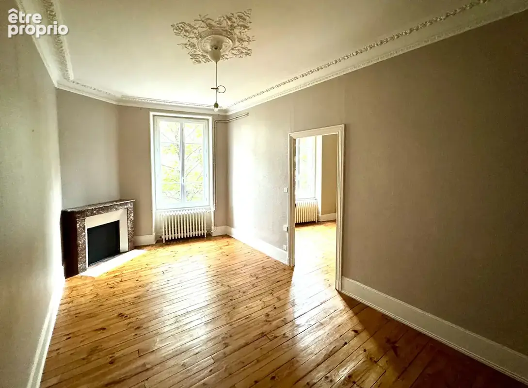 CLERMONT-FERRAND / Immeuble de caractère du XIXe, 84 M2 habitables et espaces chaleureux ! - photo 4