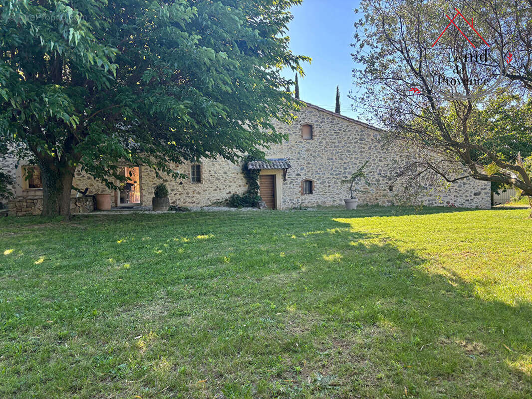 Maison à LAUDUN-L'ARDOISE