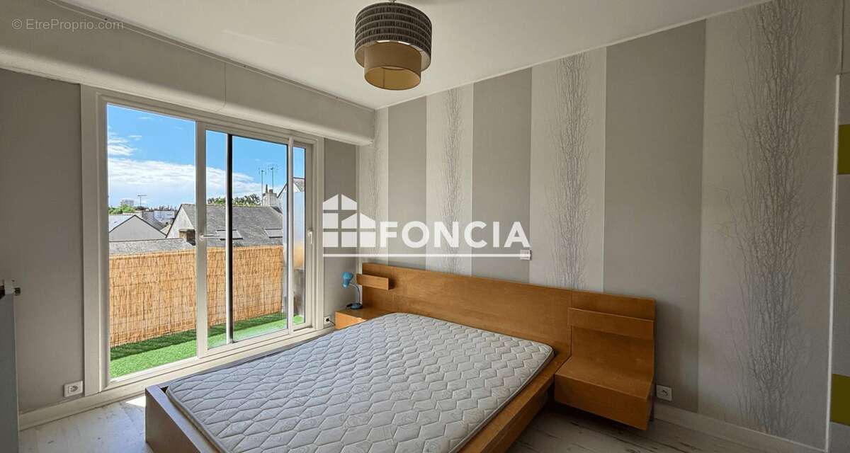 Appartement T2 plein sud avec cave et place de parking sécurisée - photo 6