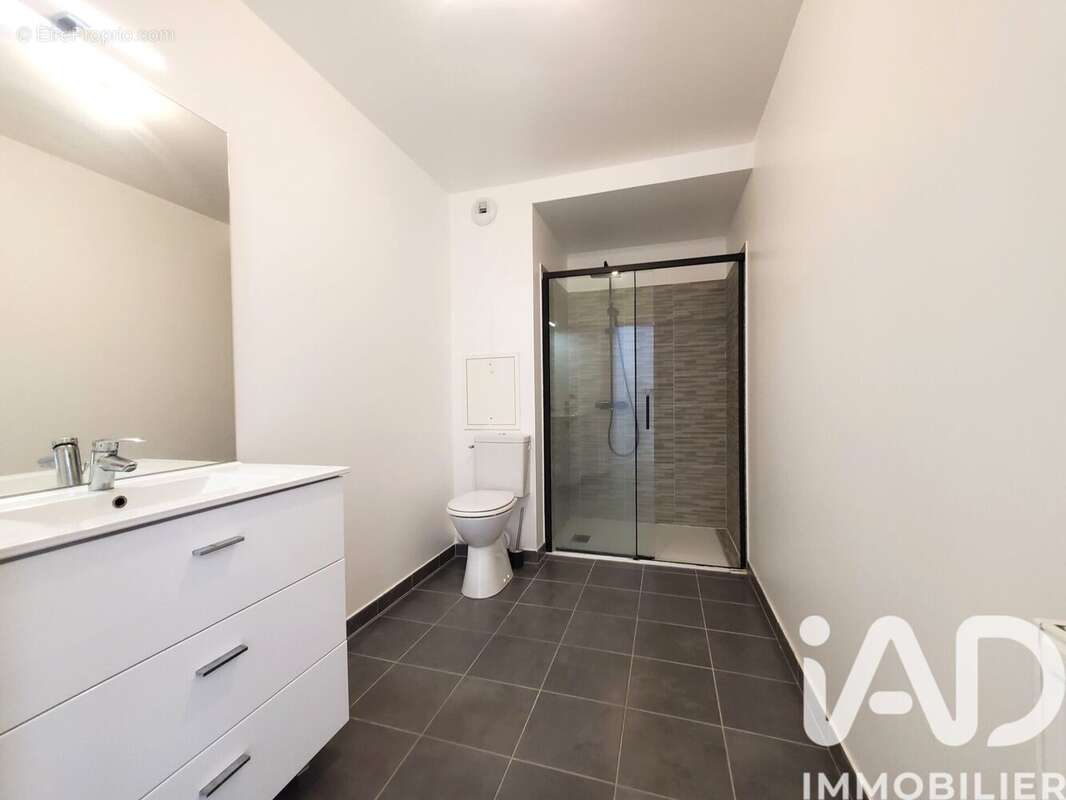 Photo 8 - Appartement à VOISINS-LE-BRETONNEUX