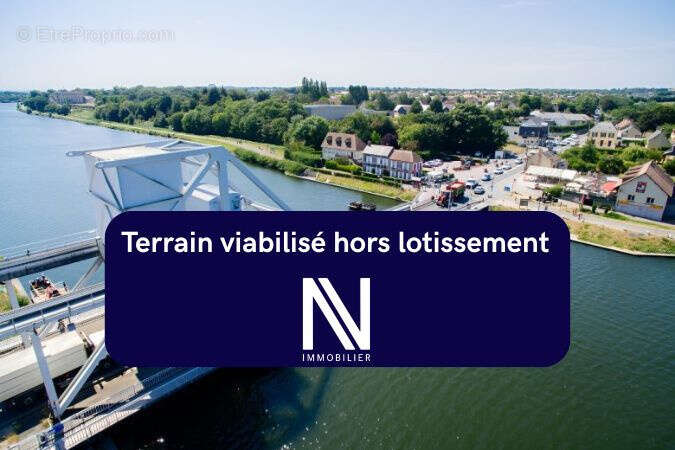 Terrain à BENOUVILLE
