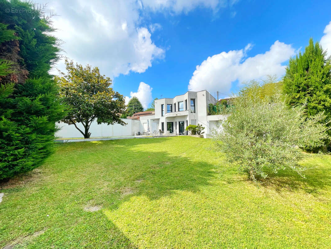 Découvrez une maison d'exception au cœur d'Irigny - photo 7
