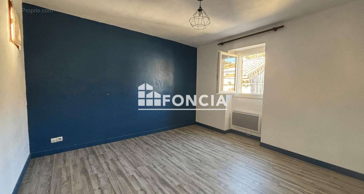 Maison à LAUDUN-L'ARDOISE