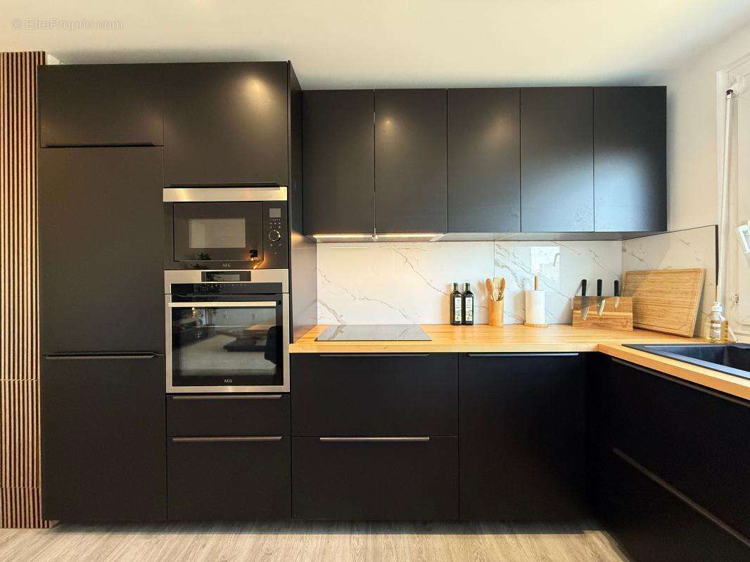 Superbe APPARTEMENT rénové à proximité immédiate des commerces - photo 7