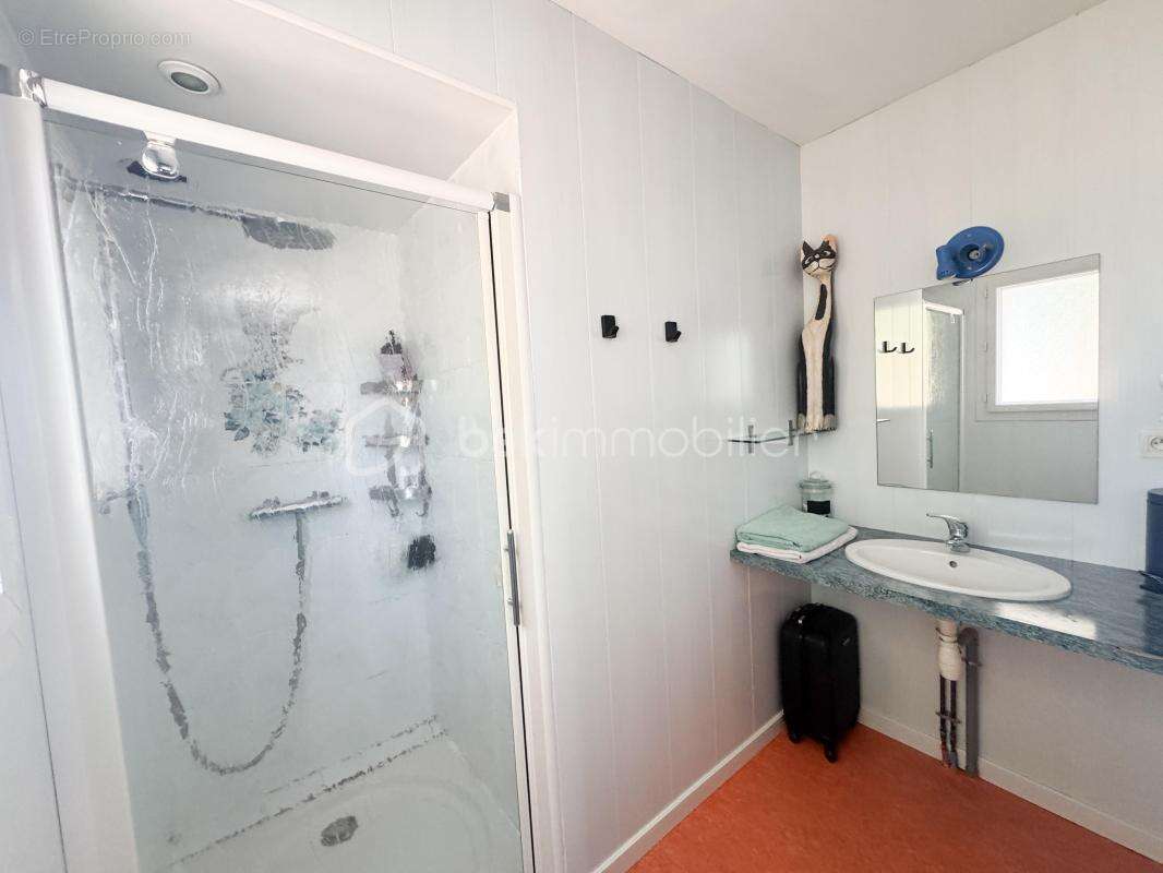 Maison de plain-pied 4 chambres 130m2 + véranda de 45m2 - photo 17