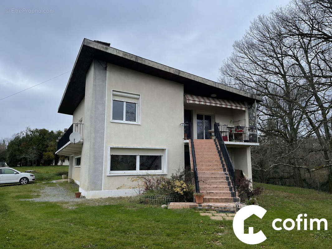 Maison à BUROS