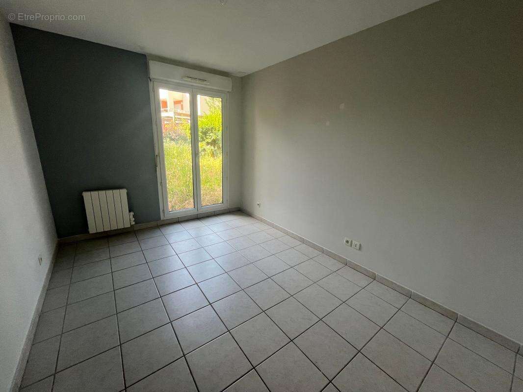 Appartement T4 de 86 m² en rez-de-jardin – Centre de Pont-de-Chéruy - photo 8