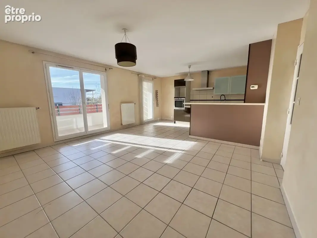 À vendre   mions centre   t3 de 64 m2 avec grande terrasse et garage en sous-sol - photo 1