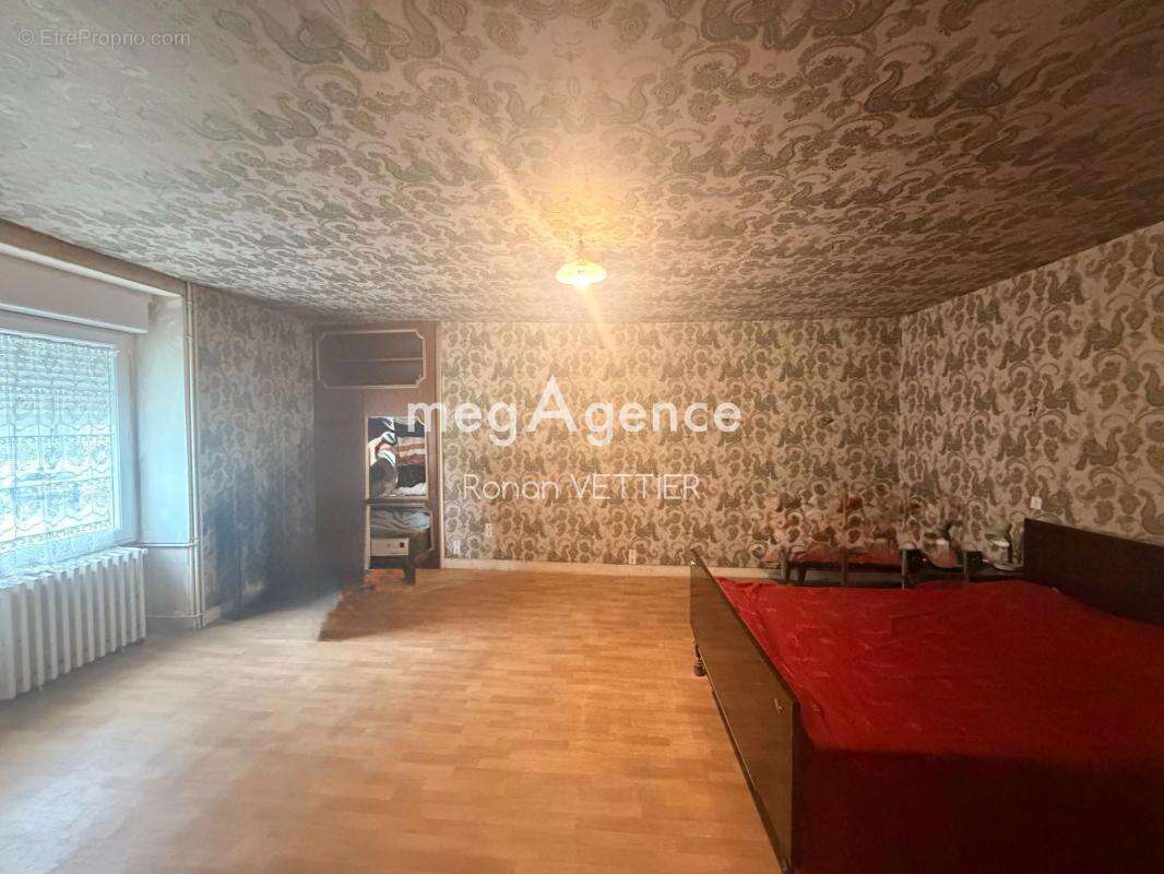 Maison de bourg en pierre 151 m² sur un terrain de 800 m² - photo 5