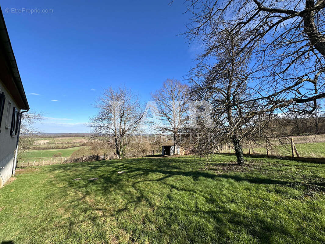 Maison à CONDE-SUR-HUISNE