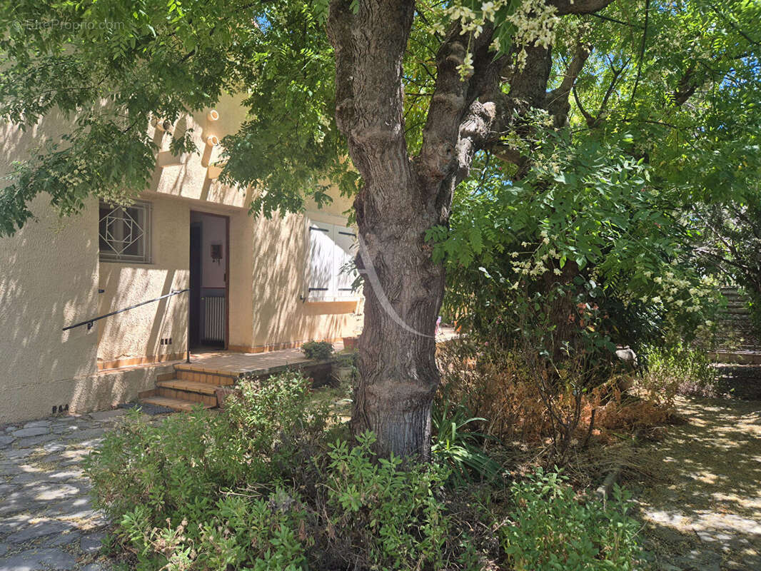 Maison plain-pied  avec 1000 m² de terrain POUSSAN - photo 10