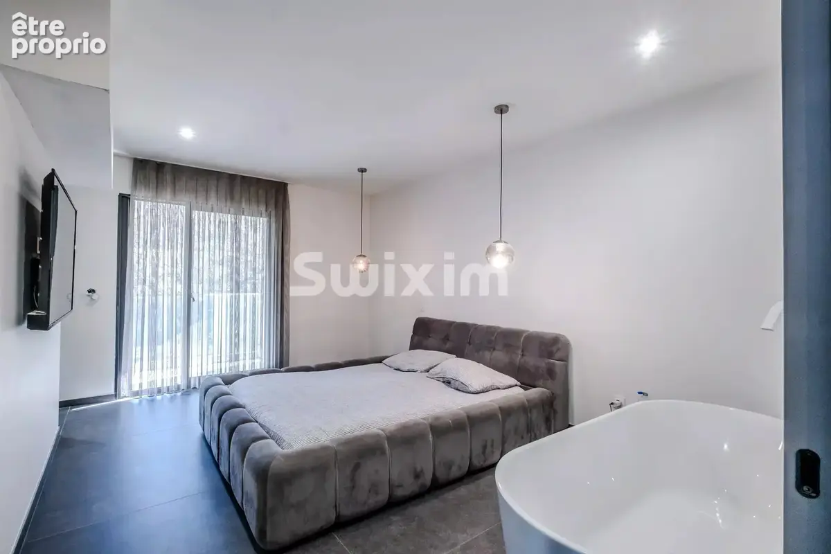 ALLINGES – Maison contemporaine aux volumes exceptionnels - photo 8