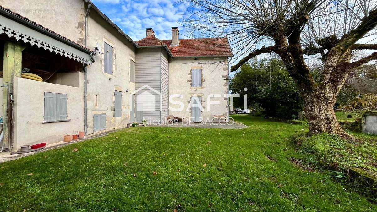 Photo 1 - Maison à CASTELJALOUX