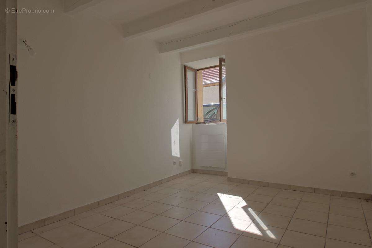 Immeuble de rapport avec 2 appartements et une maison - photo 11
