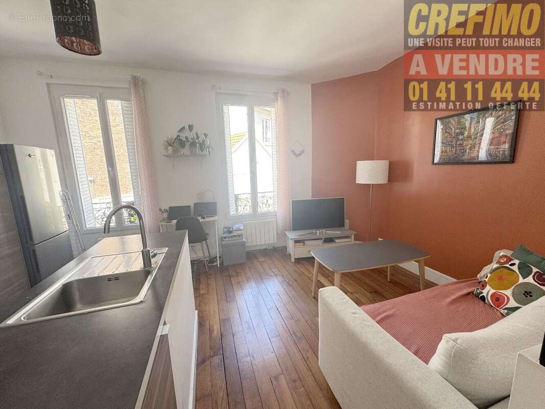Appartement de caractère avec cachet, belle pièce de vie, cuisine aménagée à Asnières-sur-Seine. - photo 5
