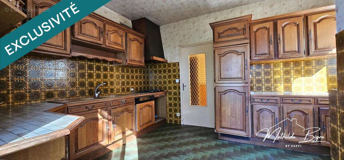 Photo 2 - Maison à SAINT-GERMAIN-LEMBRON