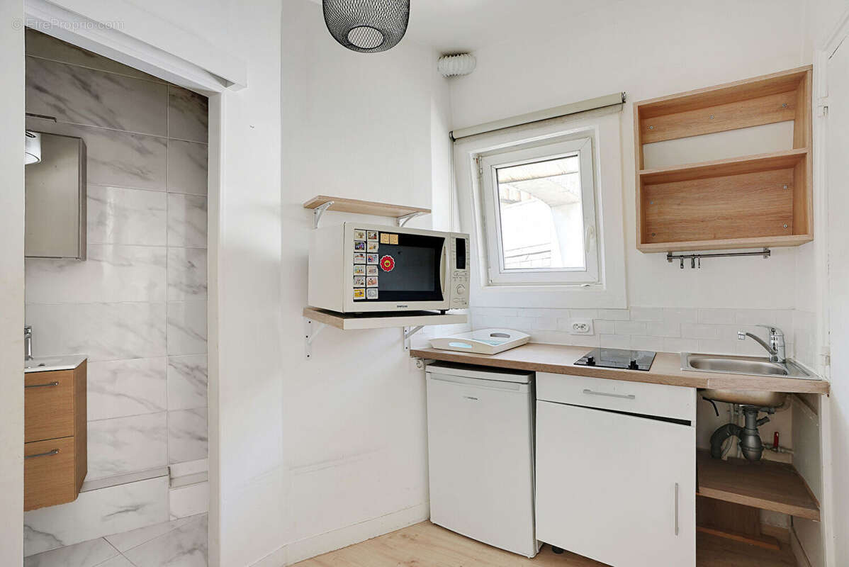 Appartement Paris 1 pièce(s) 14 m2 - photo 11