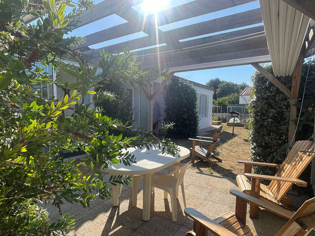 Maison 3 chambres avec véranda, garage et terrain de 578 m²  - Environnement calme - photo 4