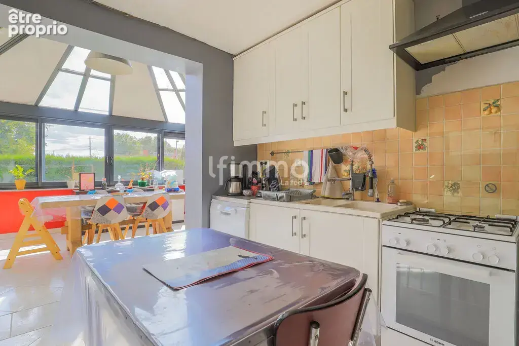 Maison avec jardin et garage – Une belle opportunité à saisir ! - photo 7