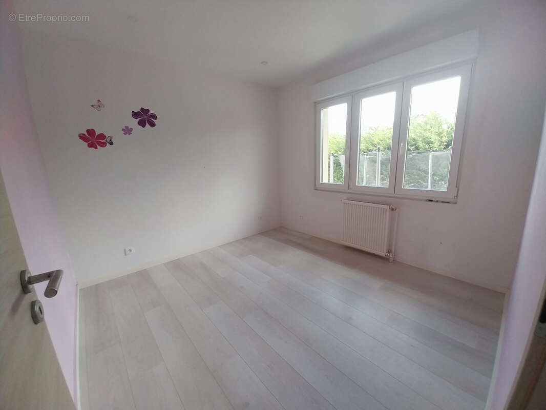 Maison à LOUVIGNY