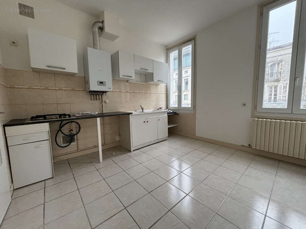 Hyper centre immeuble mixte local commercial et triplex f4 - photo 7