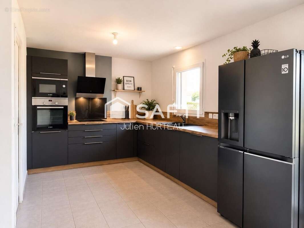 Photo 3 - Maison à VOUILLE
