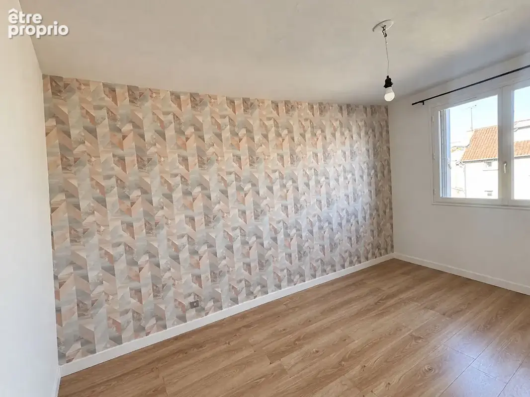T4 de 78 m² avec double séjour : de l'espace, un box et une cave ! - photo 3