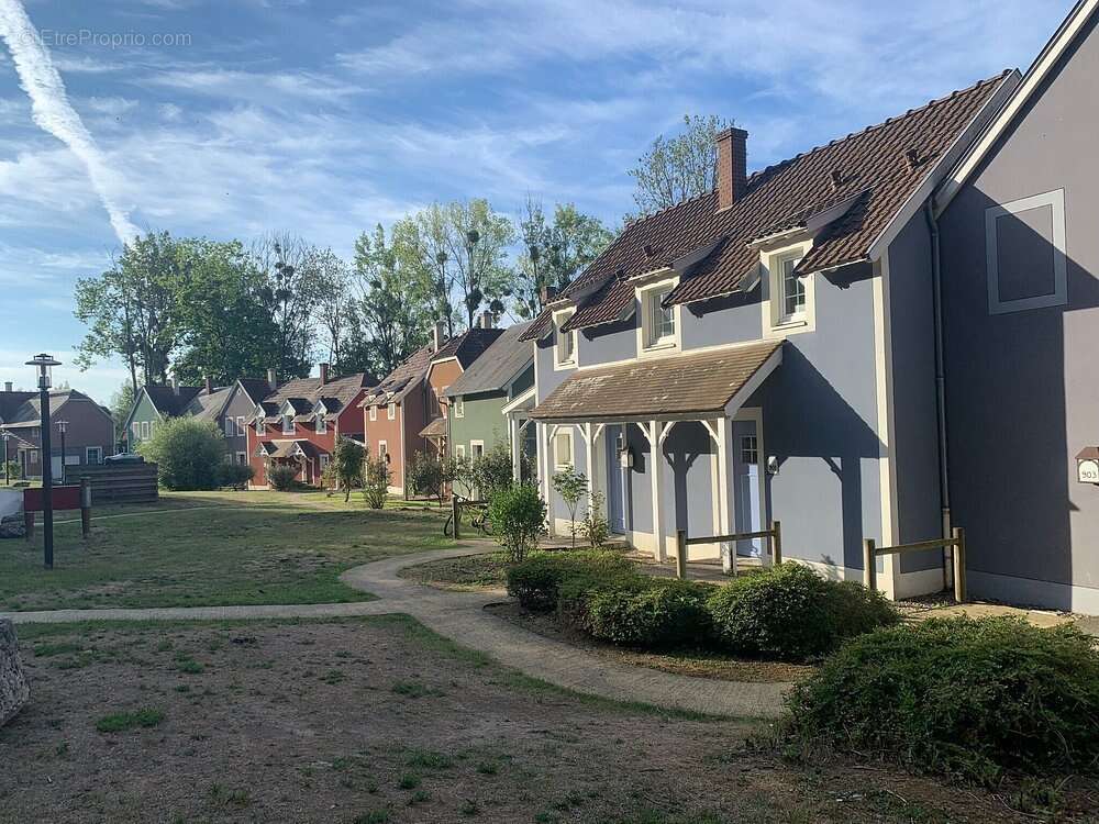 INVESTISSEMENT LOCATIF  CHAMOUILLE  Résidence de tourisme Center Parcs Le Lac d'Ailette - 6.52% de rentabilité - photo 14
