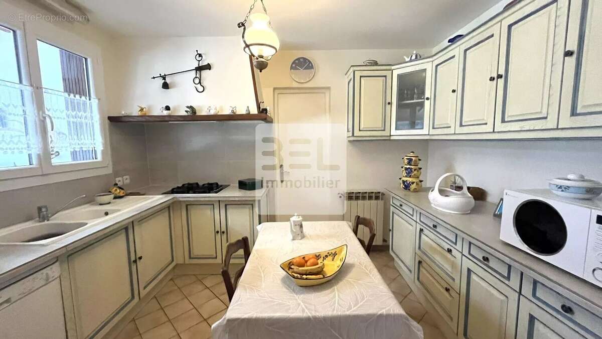 Maison à LAUDUN-L'ARDOISE