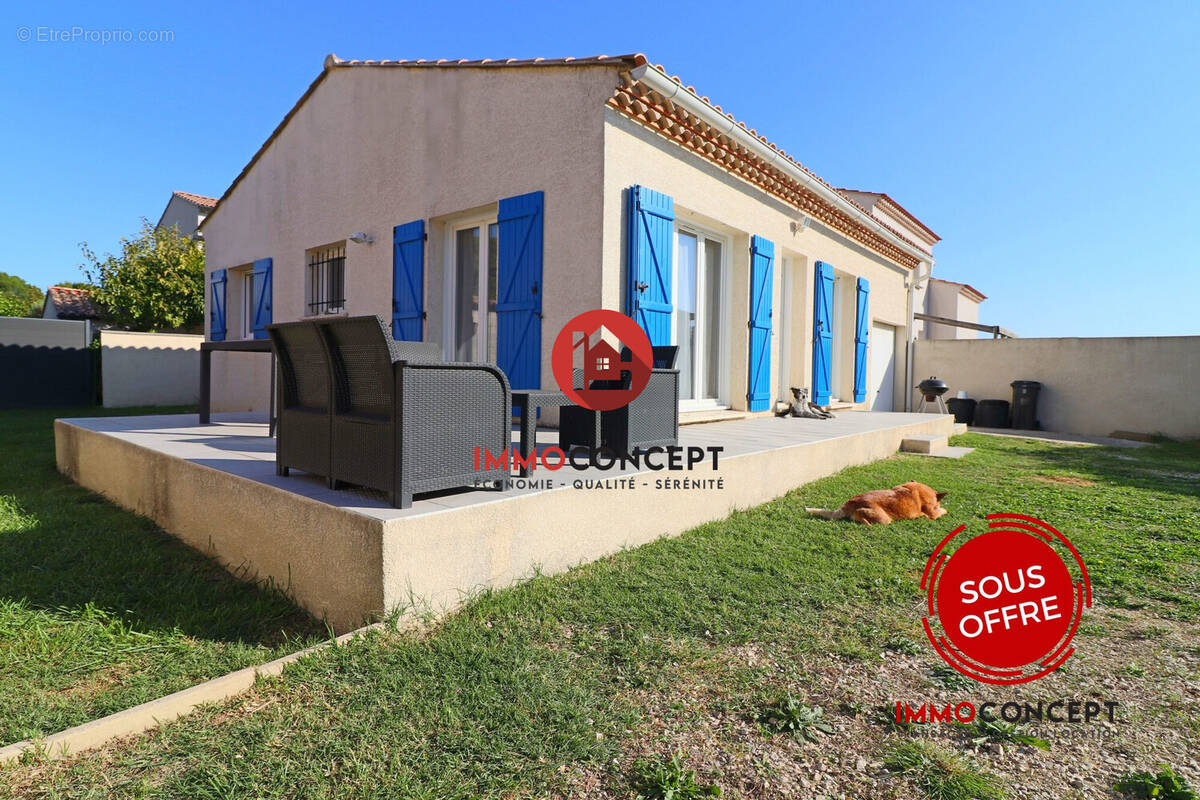 Maison à LAUDUN-L&#039;ARDOISE