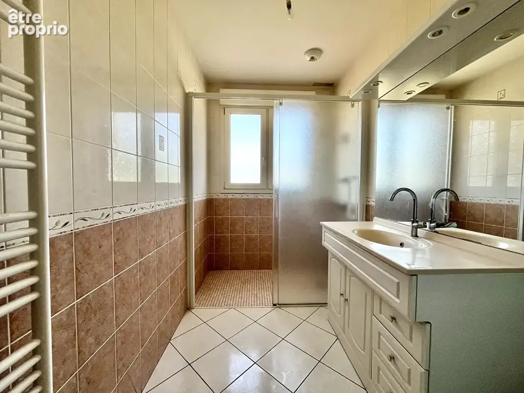 Appartement T4 - 96m² avec jardin privatif + 2 places de stationnement - photo 9