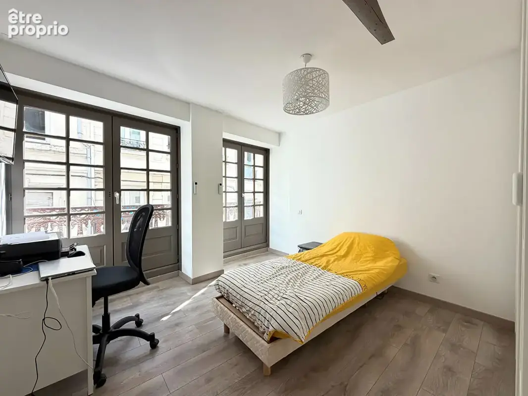 Appartement 131 m²  4 chambres  Patio  Centre-ville de Saint-Étienne - photo 9