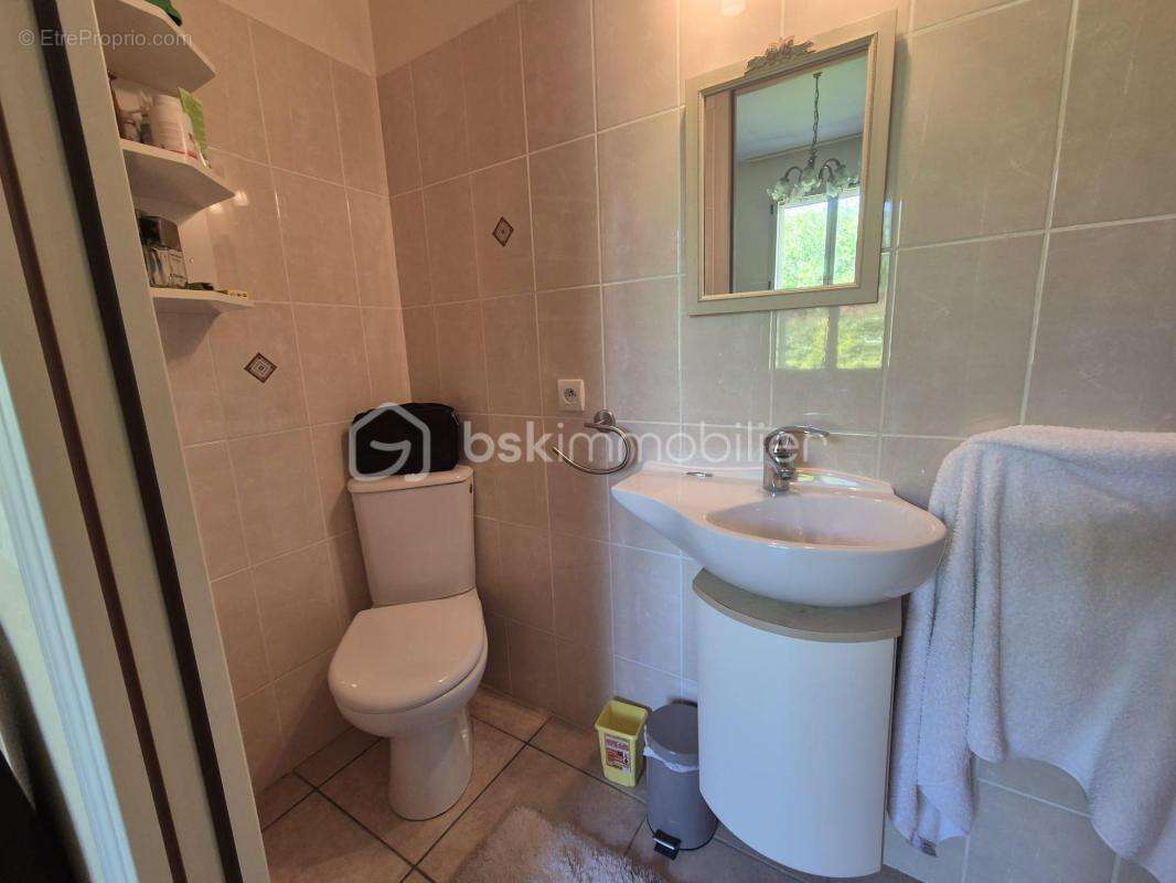 Maison de plain-pied de 124 m² - photo 16