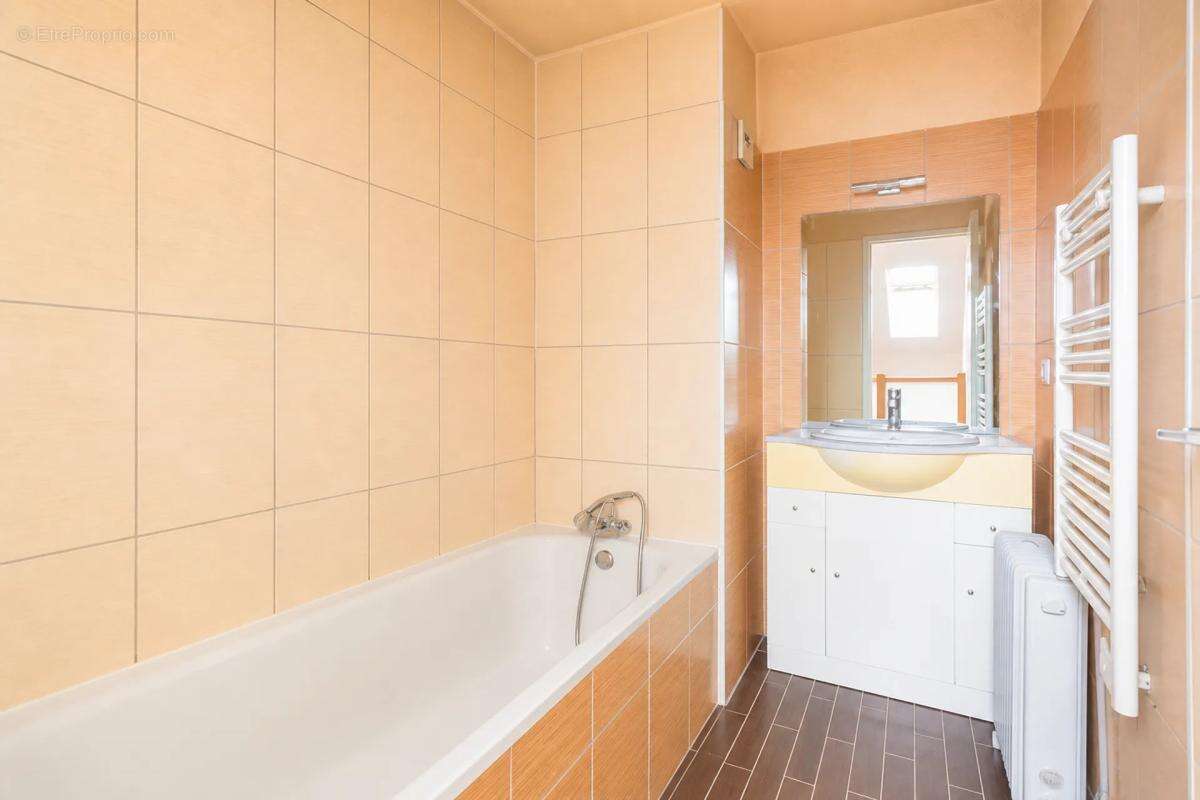 Duplex lumineux de 106 m² loué à Sannois - photo 8