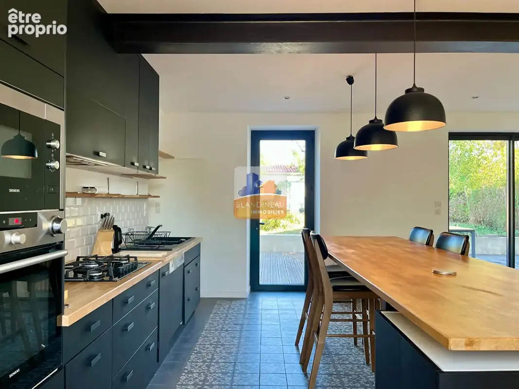 Bouguenais les couets, maison de 130 m², 3 chambres, bureau, garage 70m² - photo 3