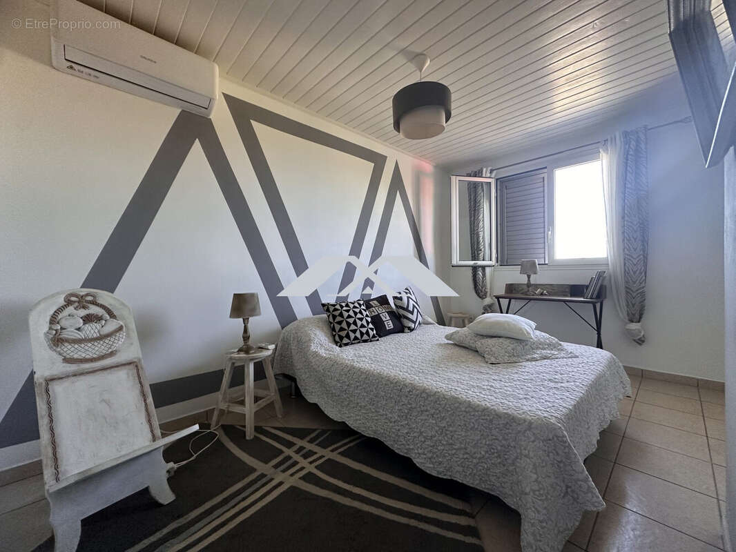 Maison 126 m² à Saint-Joseph  - photo 6