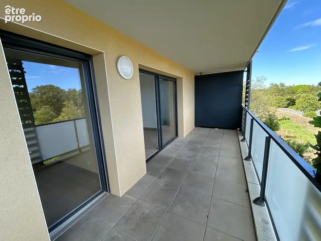 Appartement T3 de 57,80 m2 avec balcon et stationnements - photo 2